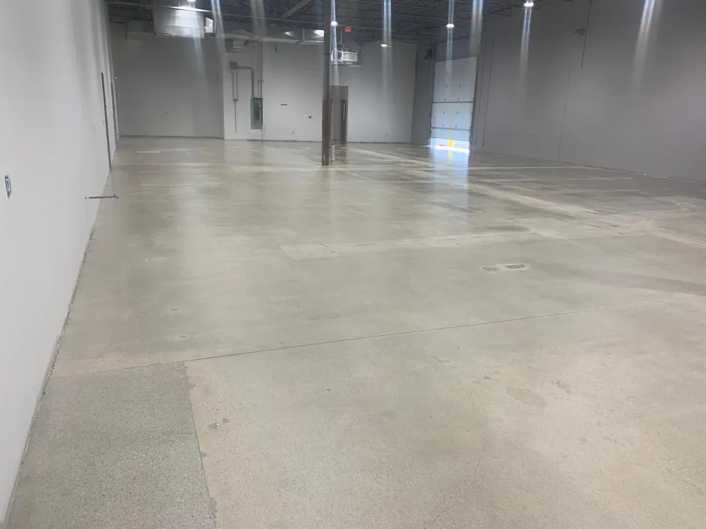 Comparison of polished concrete flooring with traditional flooring options, highlighting aesthetic and functional differences.